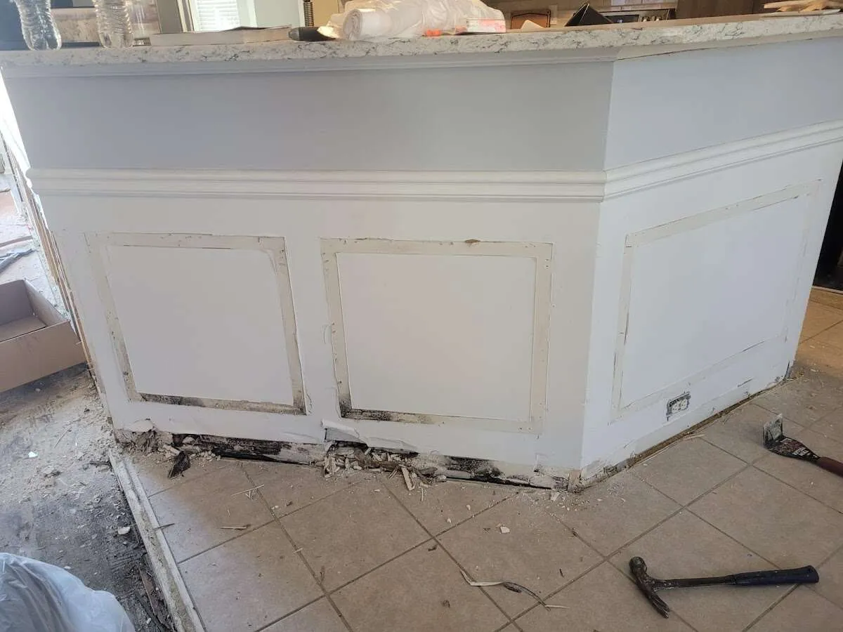 Water damage and mold on kitchen during Storm Damage Restoration in Lawrence